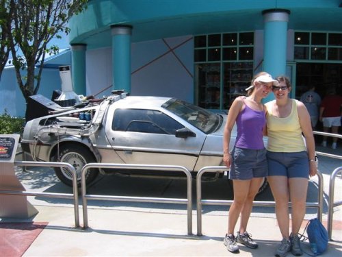 Jo and Jess in front of the delorian